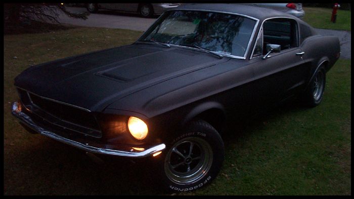 1968 Ford Mustang coupe, matte black paint, chrome bumper, driving lights