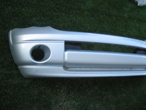 2005 Dodge 3500 - A silver front bumper, likely for a truck, is shown from the front with a circular opening visible.