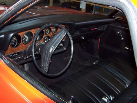 1973 Ford Ranchero - interior-clean and back to original; I re-upholstered the seat in black vinyl, installed new carpet and Dynamat on the floor, and installed…