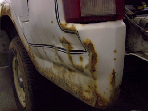 1986 Ford Bronco - Driver's side rear-end damage.
