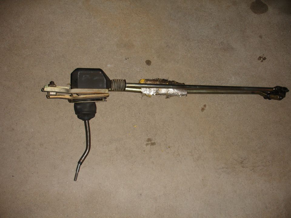 car shift linkage assembly with rubber boot and metal rods