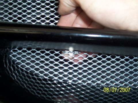 1998 Dodge Avenger - You can reach the top clip like so, careful the metal is sharp