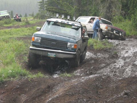1995 Ford Bronco - A 1995 Ford Bronco navigates a muddy off-road course during the Rocky Mountain Bronco Rally 2007.