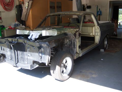1967 Ford Ranchero - windshield and rear glass out and hood off, what a pain getting all the wetherstrip adhiesive off...