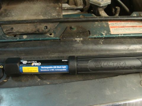1996 Ford Bronco - A rechargeable LED work light is placed within the engine bay of a vehicle.