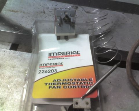 1989 Ford Bronco - A close-up of an Imperial adjustable thermostatic fan control unit, part number 226203, is shown.