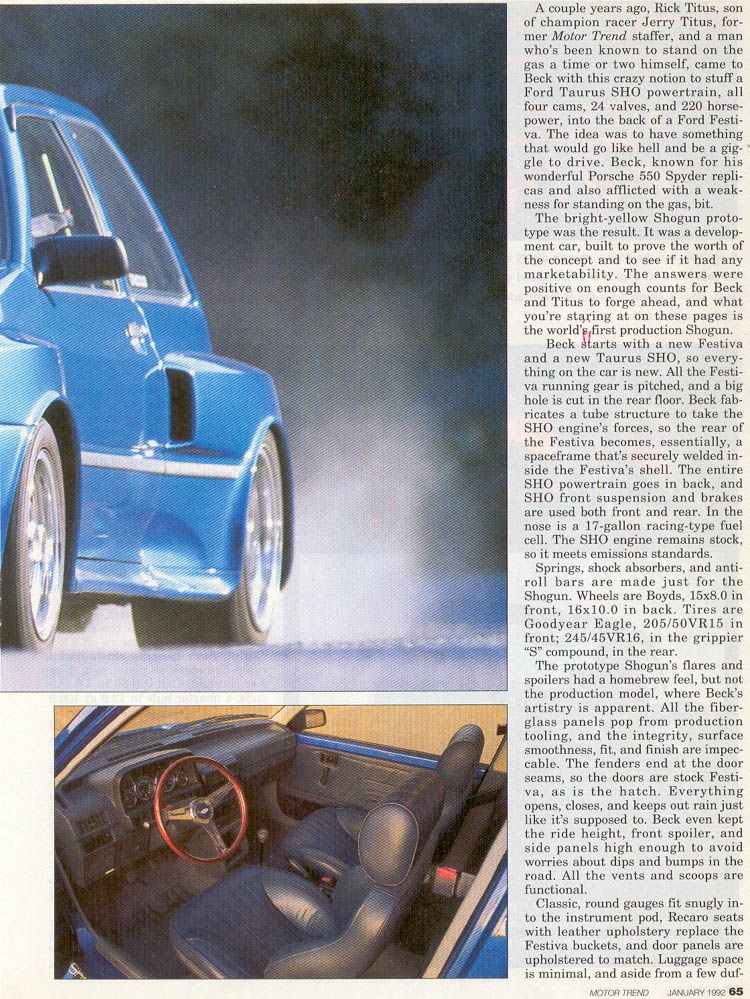 Blue custom car exterior and racing interior with bucket seats and aftermarket steering wheel