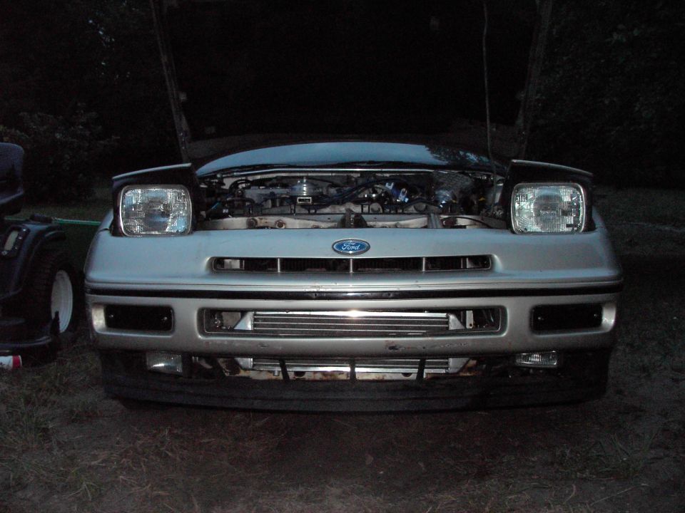 Silver 1989 Ford Probe front view, hood open