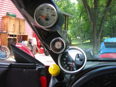 1995 Ford Probe - Custom gauges are installed inside the vehicle, showing RPM and oil temperature readings.