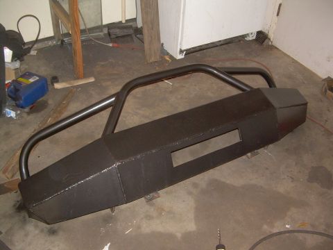 1993 Toyota 4Runner - Custom fabricated steel front bumper with brush guard hoop, shown indoors.