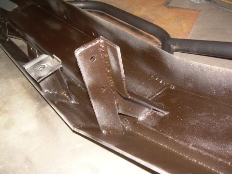 1993 Toyota 4Runner - Close-up of a custom-fabricated front bumper part, showing welding and mounting brackets.