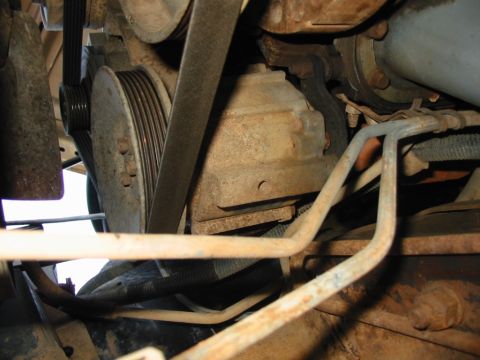 1988 Ford Bronco - Engine pulleys and hoses are visible in this close-up view.
