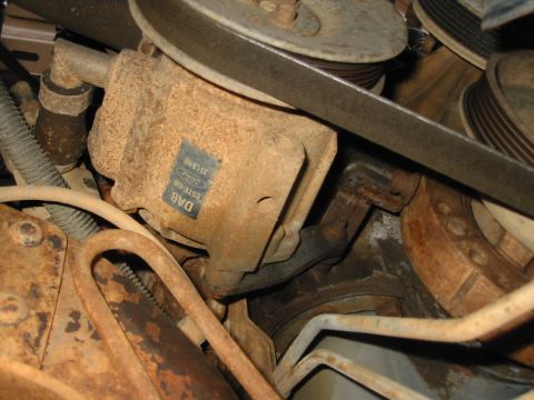 1988 Ford Bronco - A close-up view of a Ford power steering pump, showing its part number and manufacturer details.