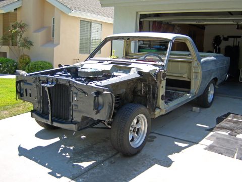 1967 Ford Ranchero - rollled outside to hose off rust inhibitor from floor boards