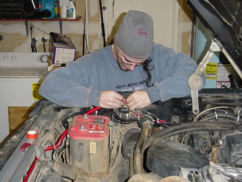 1989 Ford Bronco - Thats me, taping up the wire covers