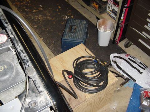 1989 Ford Bronco - And ran the hose outside. It moves alot of air when you rev up the truck a little bit. Tomorrow I put in the rest of the toys