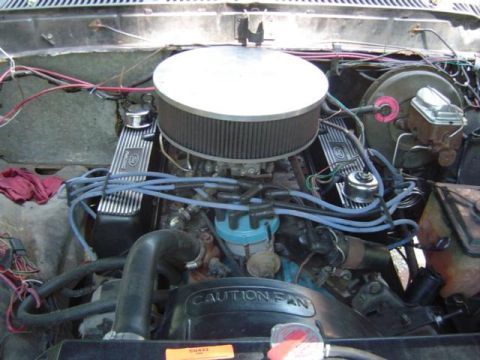 1979 Ford Bronco - Close-up view of the engine bay, showing various components and wiring.