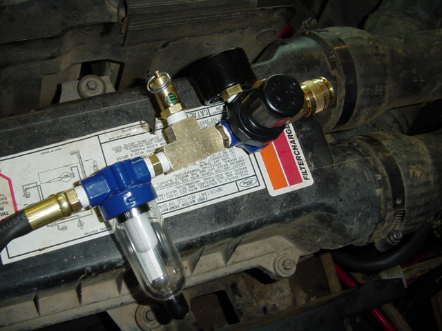 This is all the fun stuff, The water/oil seperator, 150 PSI pop off valve, Regulator with guage, and the connector to hook up all the air toys