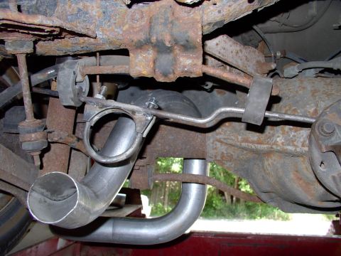 1990 Lincoln Town Car - After hanging the new Dynomax Impala SS tailpipe loosely over the axle, my pipe bending buddy decided the hanger/clamp I made could use som…