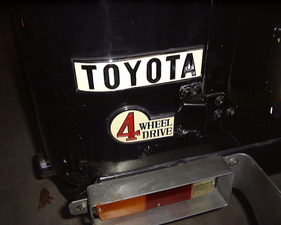 Black Toyota 4 Wheel Drive emblem and taillight