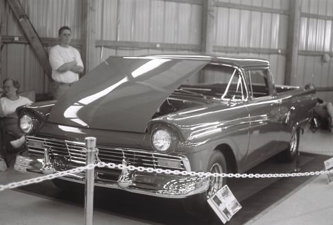 1973 Ford Ranchero - This 1957 Ford Ranchero is displayed with its hood up, likely at a car show.