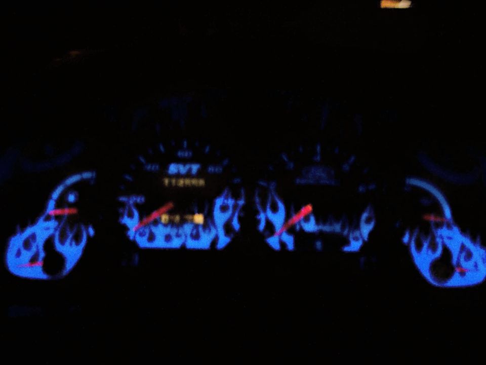 Dashboard gauges with blue flame graphics and SVT badging