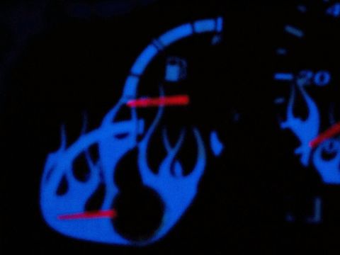 1994 Ford Probe - The vehicle's dashboard features a custom gauge cluster with blue flame graphics.