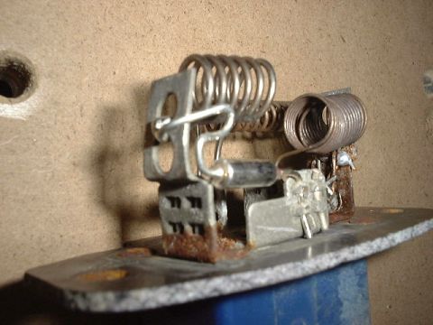 1987 Ford Bronco - I scuffed up the spot in-between the holes on the support, made a hook in the end of the lead and soldered it on. Then folded the excess le…