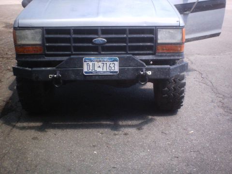 1990 Ford Ranger - Front view of a 1990 Ford Ranger showing its grille and custom bumper.