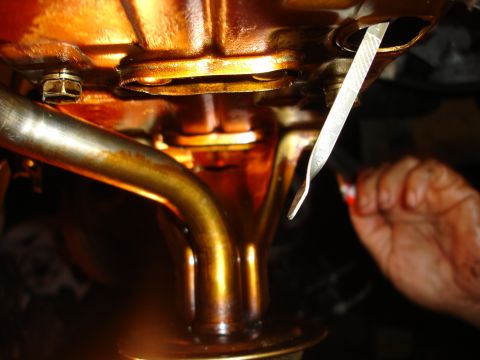 1992 Ford Taurus - Checking engine oil level with a dipstick.