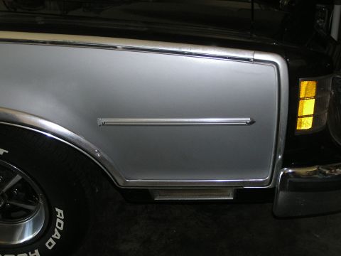 1973 Ford Ranchero - Close-up of the front fender and headlight assembly on a 1973 Ford Ranchero.