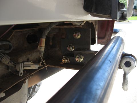 1991 Ford Bronco - Custom rear bumper fabrication hardware is visible, attached to the vehicle's frame.