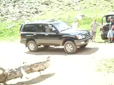 1999 Lexus LX 470 - Running through some mud.