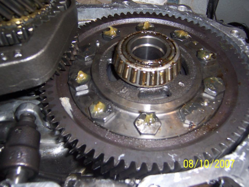 LSD installed.  I put a dab of grease on each bolt and installed top half of trans case.  I then rotated the first gear shaft which rotated the LSD to make sure there wasn't any interference when rotating.