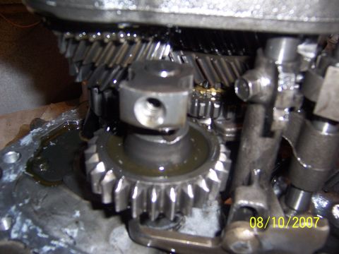 1994 Ford Probe - Internal view of a vehicle's transmission gears, showing lubrication and mechanical components.