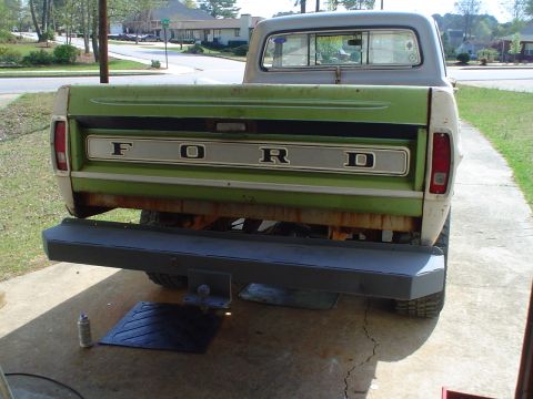 1967 Ford F-250 - Rear view of a pickup truck, likely from the early 1970s, showing the tailgate and bumper.