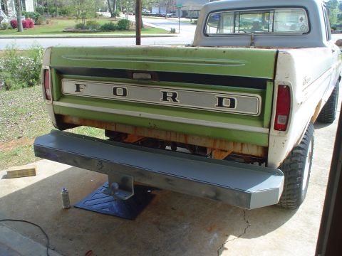 1967 Ford F-250 - Rear view of a Ford pickup truck, showing the tailgate and a newly installed bumper.
