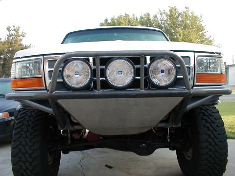 1996 Ford Bronco - Custom front bumper and lights on a Ford Bronco, likely from the 1992-1996 generation.