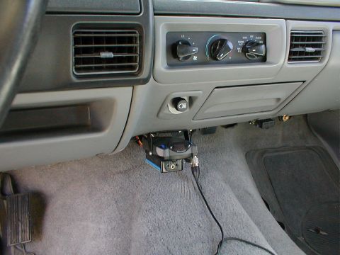 1996 Ford Bronco - Interior view of a 1996 Ford Bronco, highlighting the dashboard and an aftermarket brake controller installation.