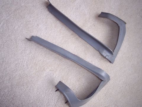 1968 Chrysler Town & Country - A pair of gray bumper spacers are shown against a carpeted background. The registry claims they are from a 1968 Chrysler Town & Country.