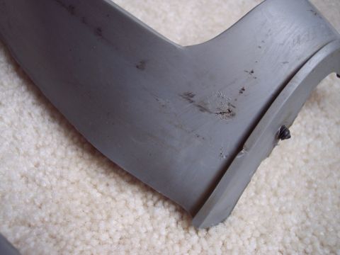 1968 Chrysler Town & Country - A close-up view of a gray plastic bumper spacer, showing wear and tear, with a Supermotors.net watermark at the bottom right.