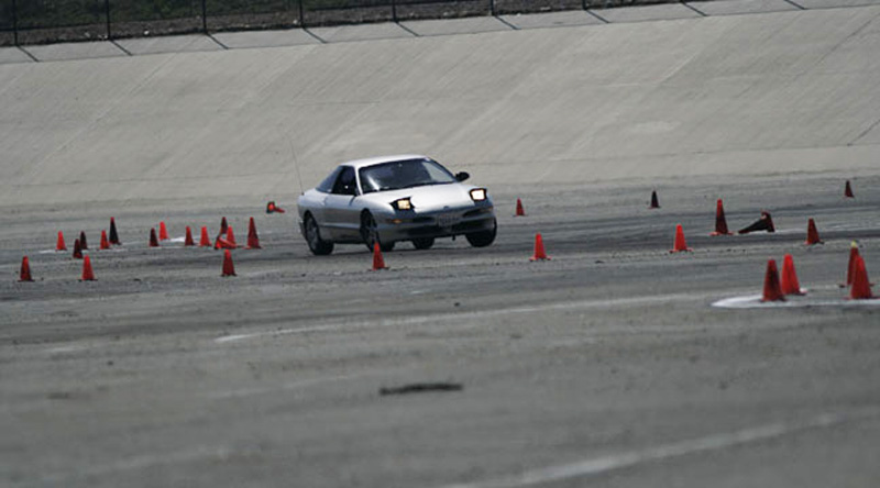Silver 1993 Ford Probe autocrossing, front 3/4 view