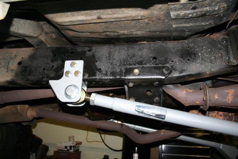 1978 Ford Bronco - Close-up of an aftermarket suspension component, labeled 'EDGE OFF-ROAD', mounted to the vehicle's frame.