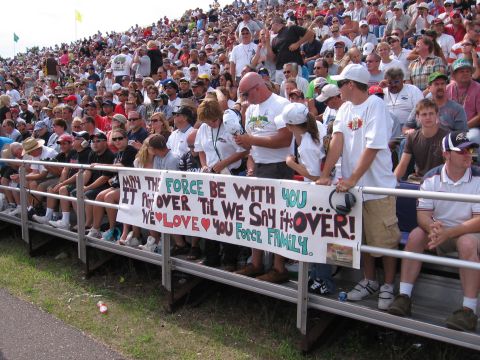 1998 GMC Sierra 1500 - Spectators in bleachers display a "Star Wars" themed banner supporting a participant.