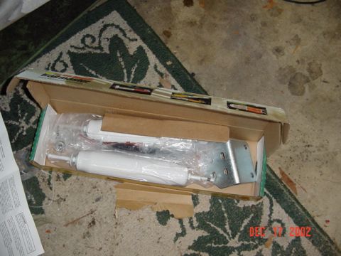1989 Ford Bronco - Mmmm new parts...I had them change out the black shock boots for red