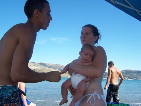 1994 Ford Probe - Family enjoys a day at the lake with a baby and clear blue skies.
