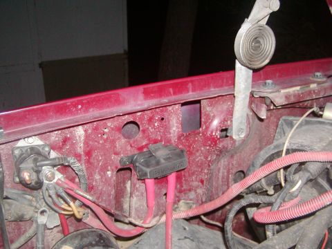1991 Ford Bronco - Close-up view of engine bay components including a starter solenoid and fuse box.
