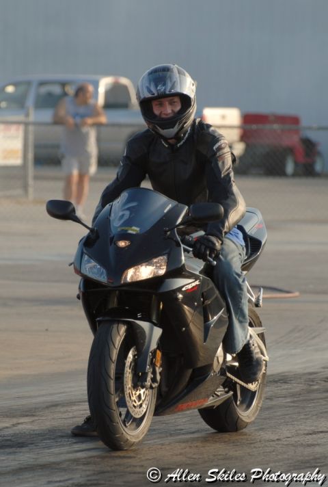 2006 Honda CBR-RR - Rider on a black 2006 Honda CBR-RR sportbike at the drag strip.