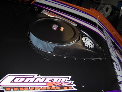 1978 Ford Bronco - Close-up of a racing car's hood, an air intake and prominent 'CORNETT THUNDER' branding.