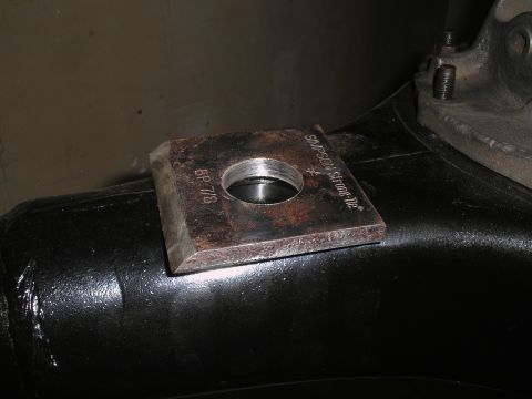 1990 Ford Bronco - Close-up of a "SIMPSON Strong-Tie" part with "BP 7/8" marking on a vehicle suspension component.